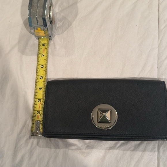 Kate Spade Black with gold. Clutch.